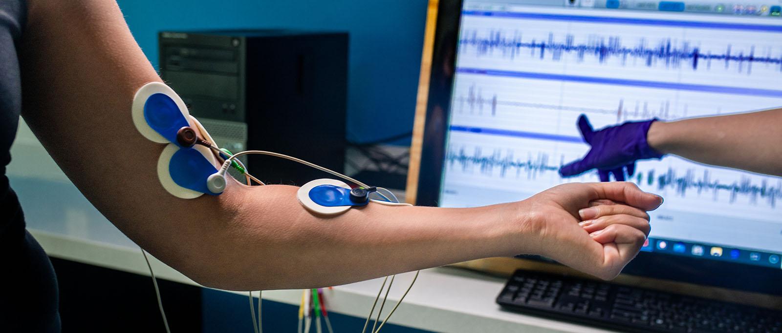 Health Performance machine attached to an athlete arm.